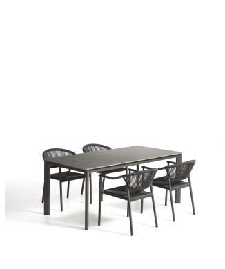 Conjunto de mesa Anafi en piedra sinterizada y aluminio grafito y 4 sillas Livadia en aluminio grafito de 180 x 90 cm.